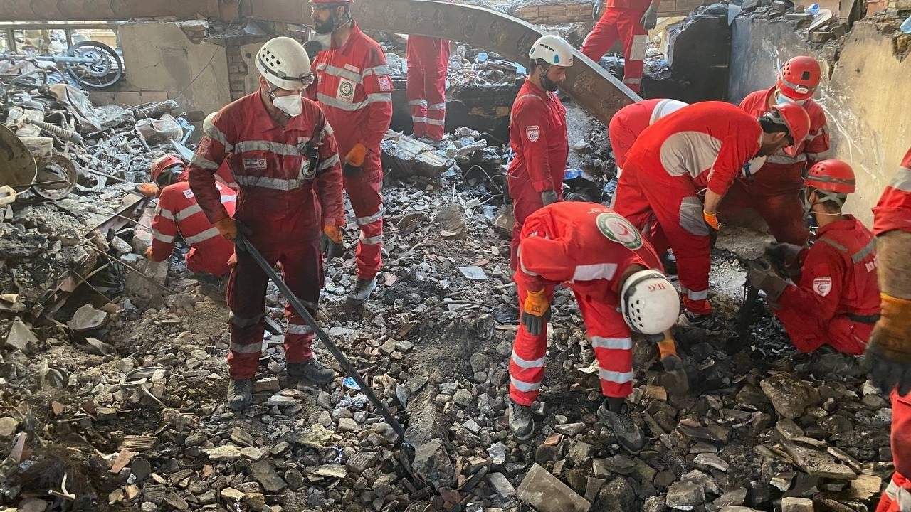 Rescue teams outside a Tehran building that was hit by an Israeli airstrike. The conflict has led to 'very tense' conditions for Gulf shipping operators