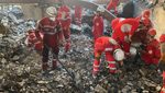 Rescue teams outside a Tehran building that was hit by an Israeli airstrike. The conflict has led to 'very tense' conditions for Gulf shipping operators