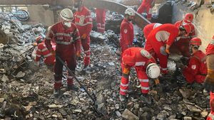 Rescue teams outside a Tehran building that was hit by an Israeli airstrike. The conflict has led to 'very tense' conditions for Gulf shipping operators