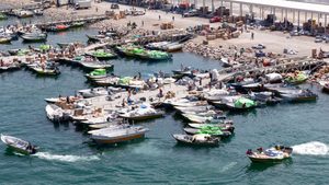 Oman's Khasab harbour. Small boats regularly cross the Strait of Hormuz taking goods and livestock to Iran