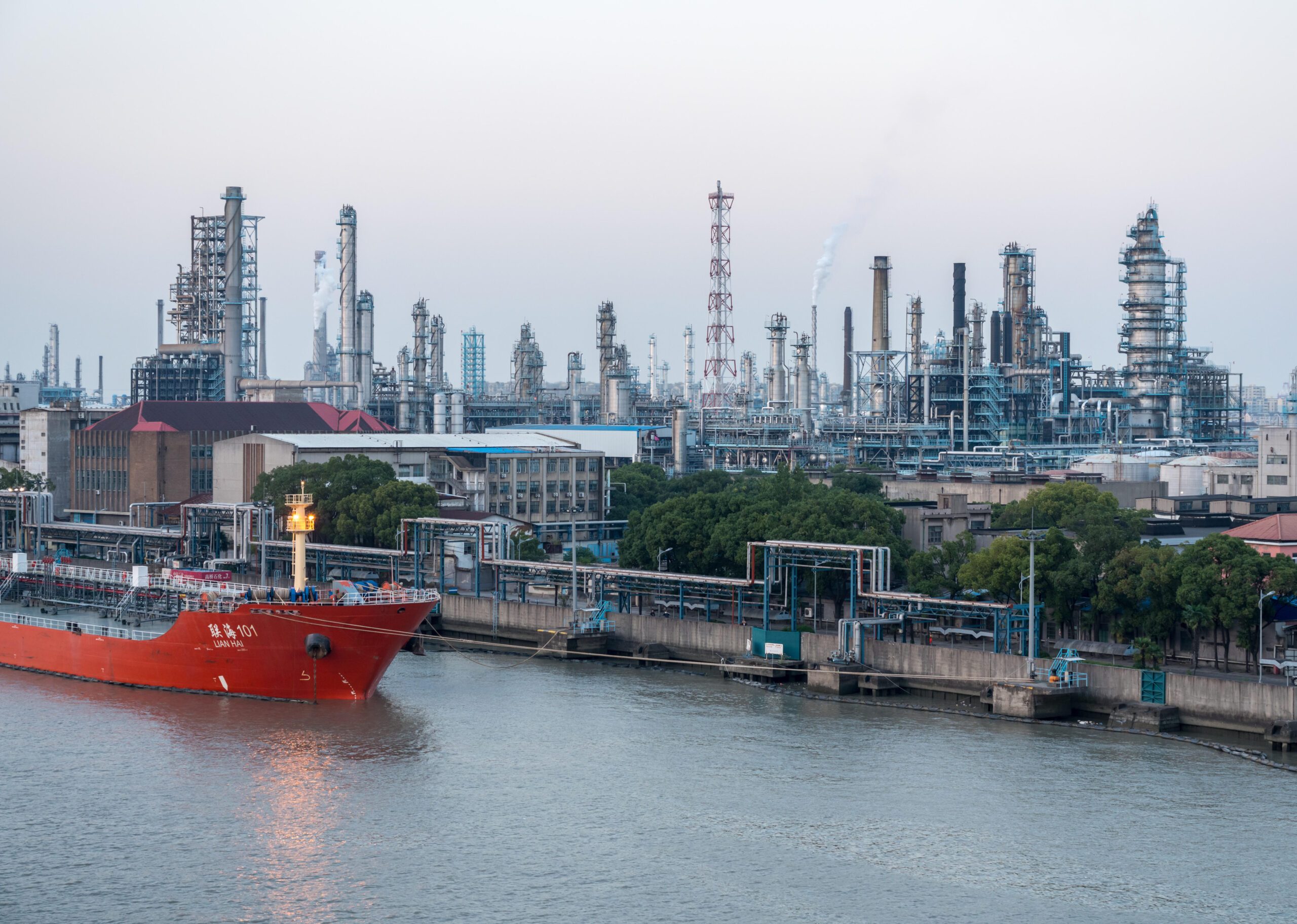 Oil refinery in Shanghai. The IEA predicts that the global peak for crude oil consumption will be around 2029, but China's peak will arrive sooner
