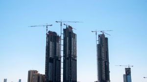 Construction in Kuwait City. Kuwait's real estate sector 'was buoyant in the first nine months of last year', research has found