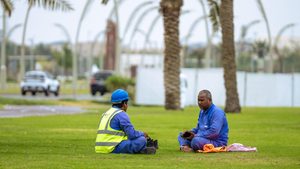 Construction workers on their lunch break in Doha. Businesses Qatar – along with Kuwait and Saudi Arabia – reported strong jobs growth in May