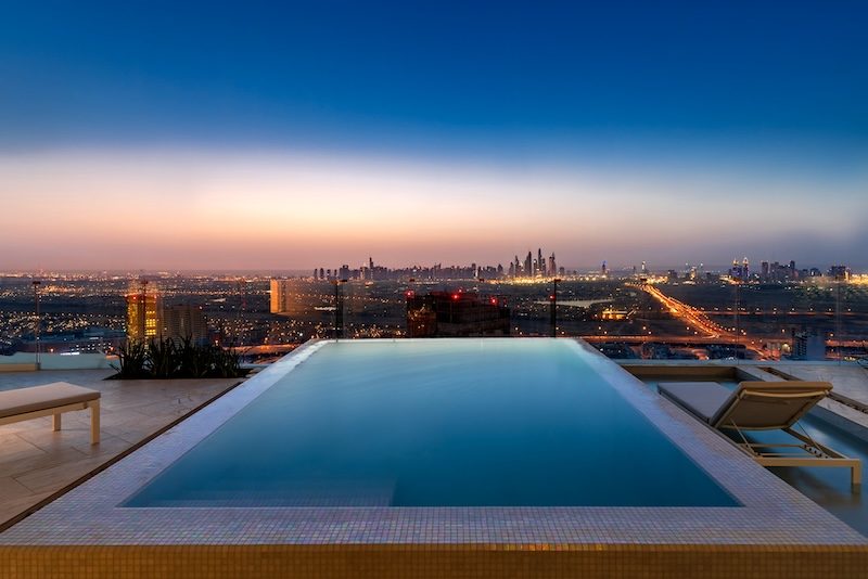 The company operates luxury hotels in Ibiza and Switzerland as well as owning one of Dubai's biggest party hotels