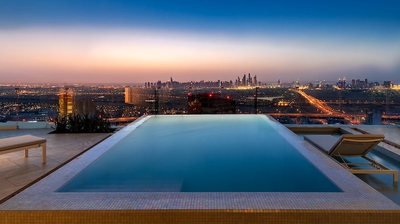 The company operates luxury hotels in Ibiza and Switzerland as well as owning one of Dubai's biggest party hotels