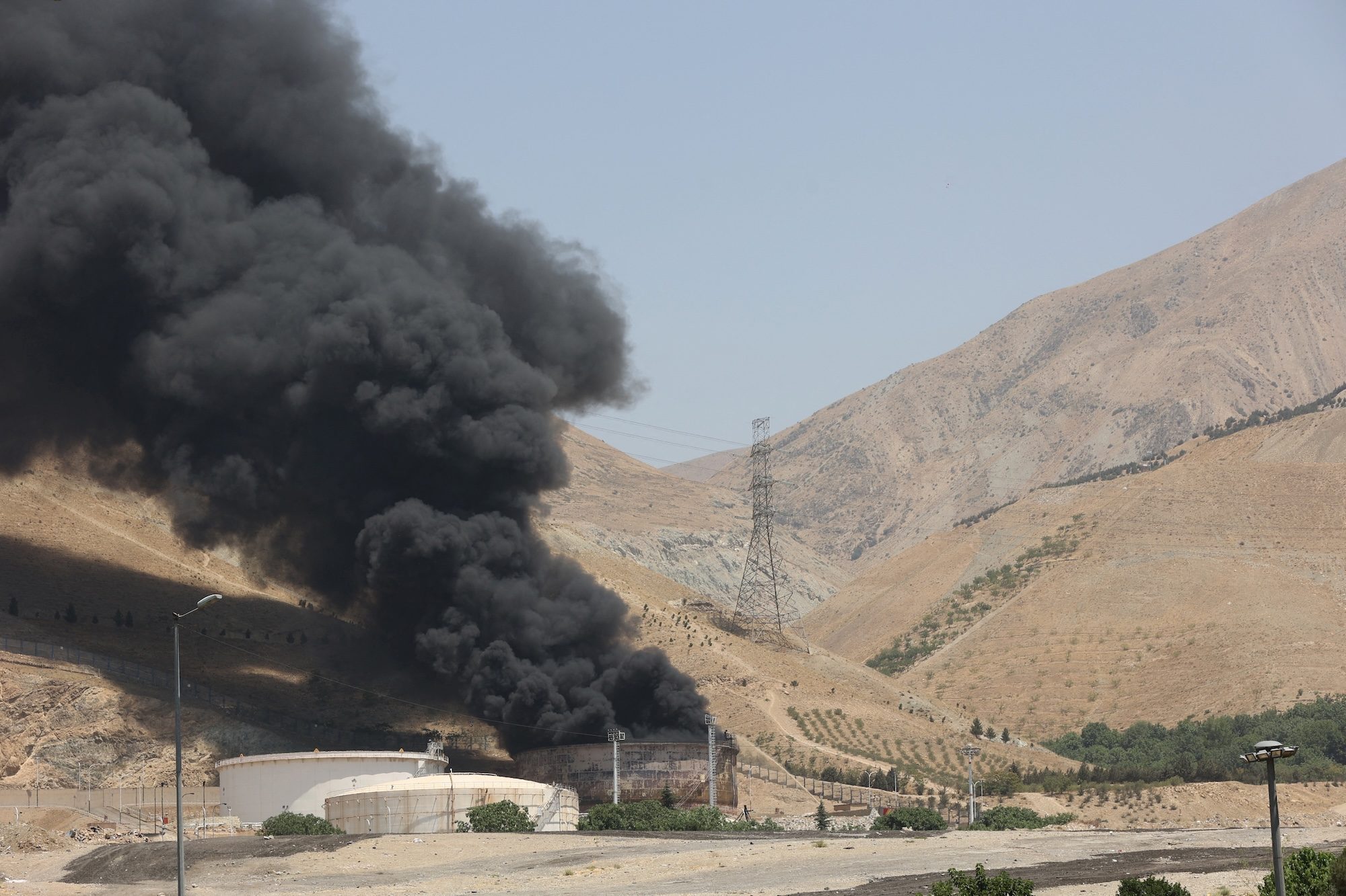 Smoke rises following what Iran says was an Israeli attack on Sharan Oil depot in Tehran, Iran, June 16, 2025. Majid Asgaripour/WANA (West Asia News Agency) via REUTERS ATTENTION EDITORS - THIS PICTURE WAS PROVIDED BY A THIRD PARTY