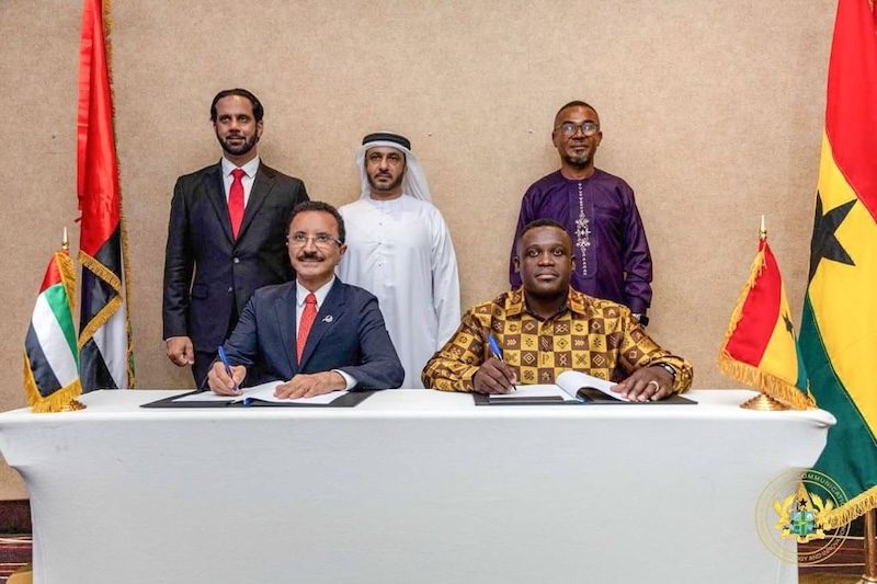 PCFC chairman Sultan Ahmed bin Sulayem and Samuel Nartey George, Ghana's minister for communication, digital technology and innovation, sign the economic zone agreement
