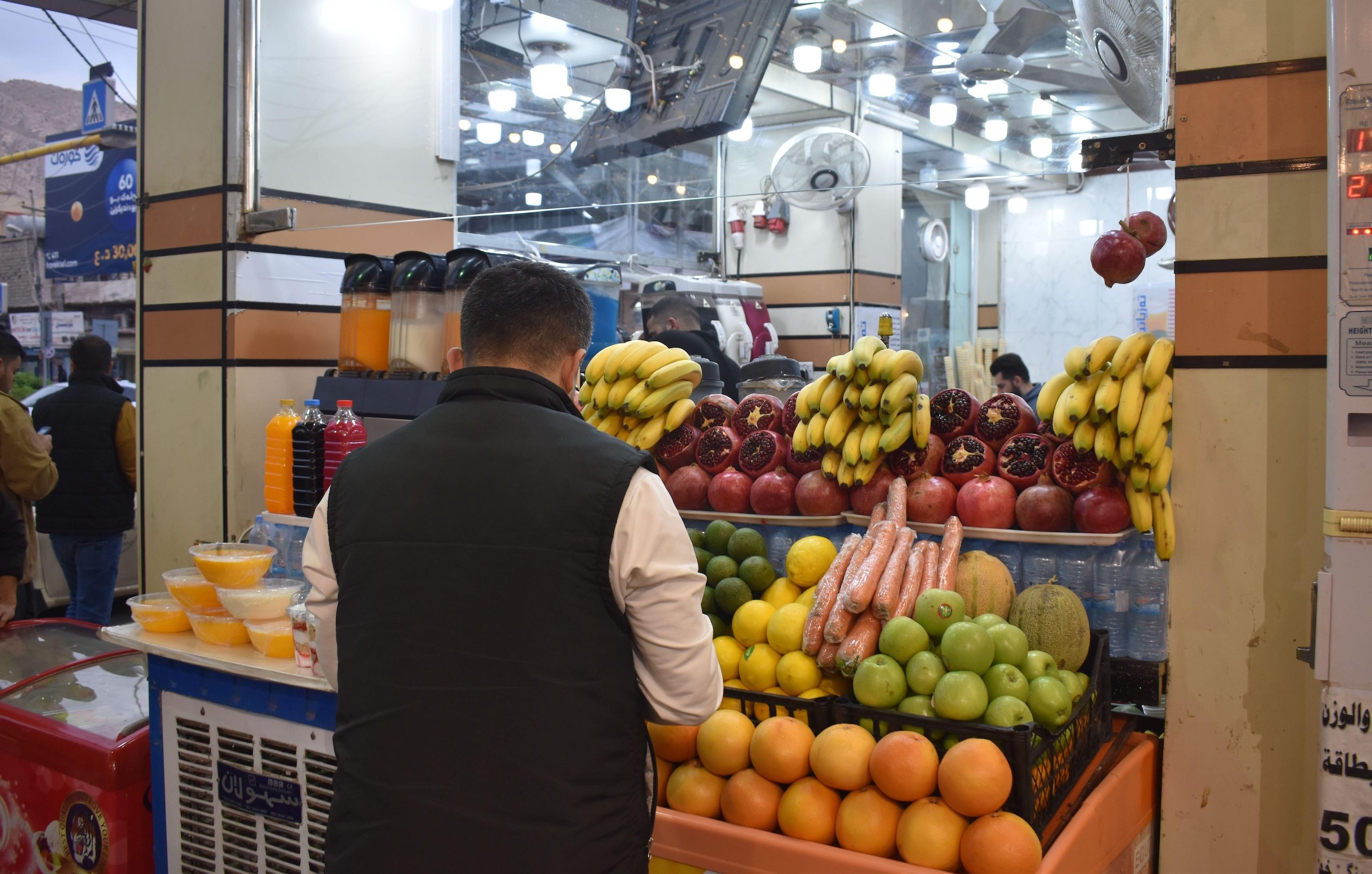 Shoppers at a market in Duhok. Two people in the province have been arrested in connection with an alleged crypto fraud