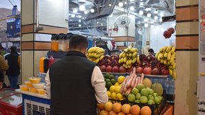 Shoppers at a market in Duhok. Two people in the province have been arrested in connection with an alleged crypto fraud