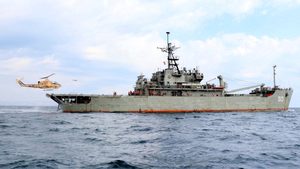 An Iranian military ship takes part in an annual drill in the coastal area of the Gulf of Oman and near the Strait of Hormuz. Disruption to the Strait would spook international oil markets