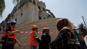Emergency workers survey the damage after missiles fired from Iran hit a residential building, in Tamra, northern Israel. The conflict is affecting most Gulf stock markets