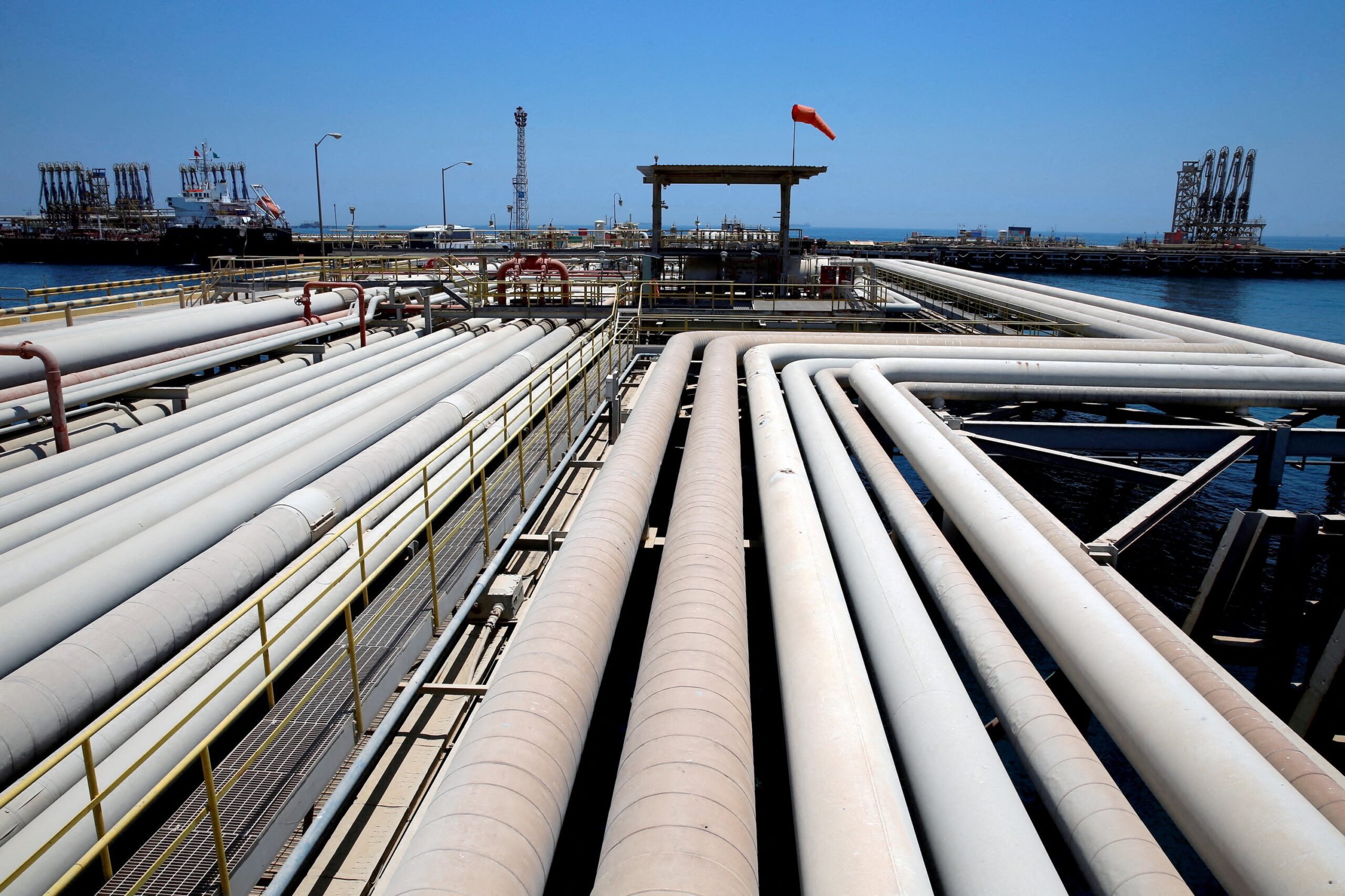 An oil tanker is loaded at Saudi Aramco's Ras Tanura oil refinery